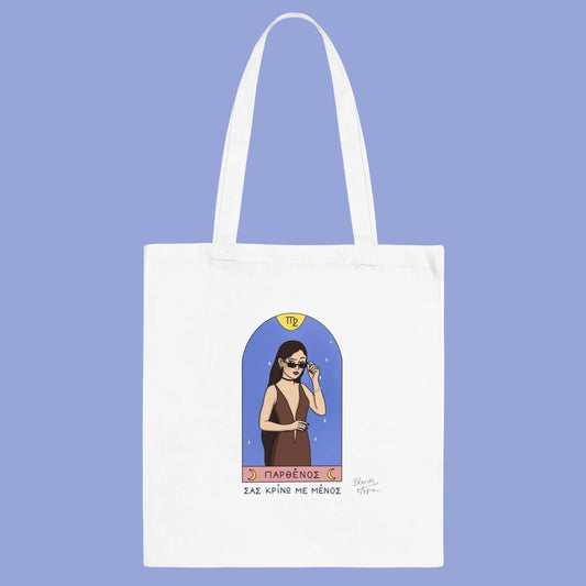 White tote bag with a graphic of a woman in a dress and sunglasses on a blue background.